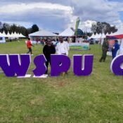 mindest foundation members eric otieno and collins njoroge pose for a photo at the world scouts parliamentary union general assembly
