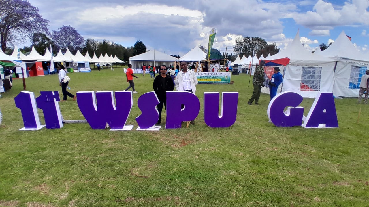 mindest foundation members eric otieno and collins njoroge pose for a photo at the world scouts parliamentary union general assembly